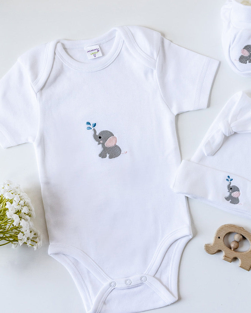 Baby clothing set with elephant designs on a light background