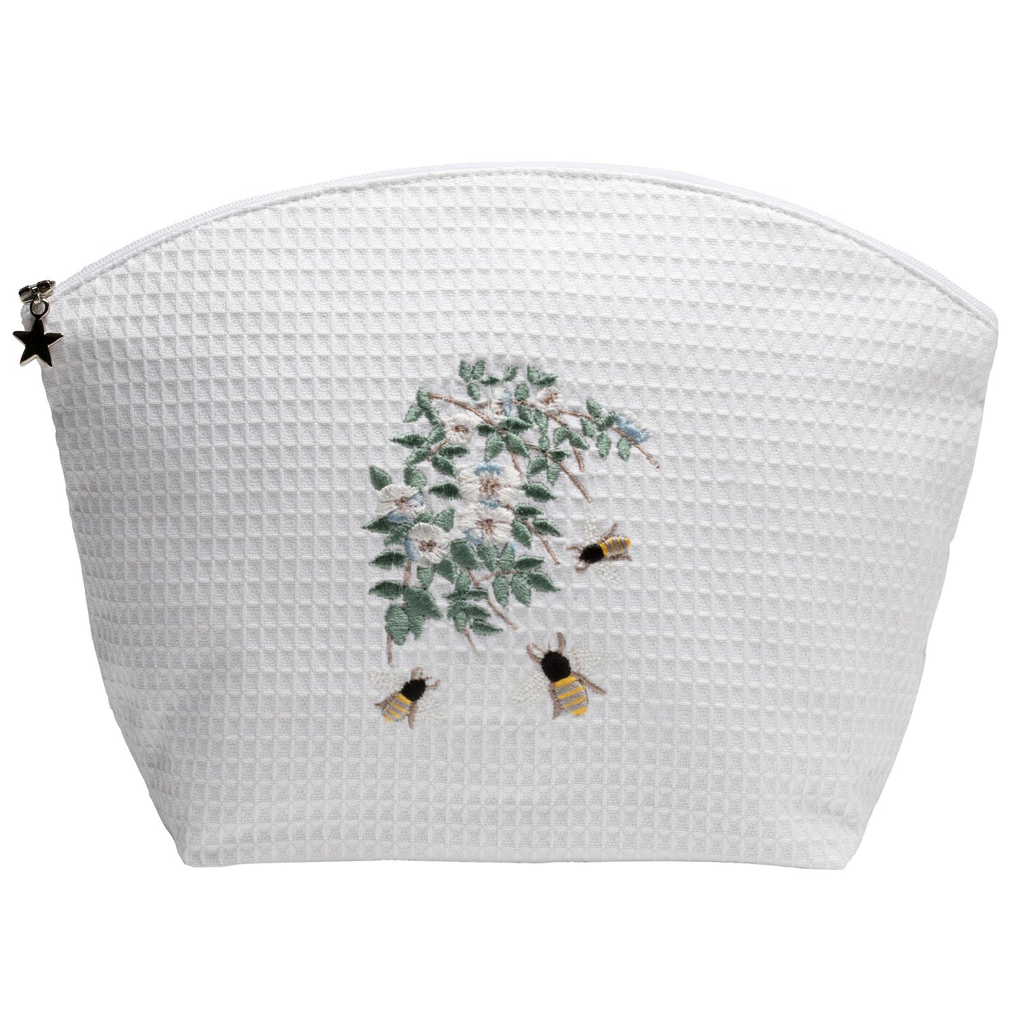 White textured pouch with floral and bee design on a white background