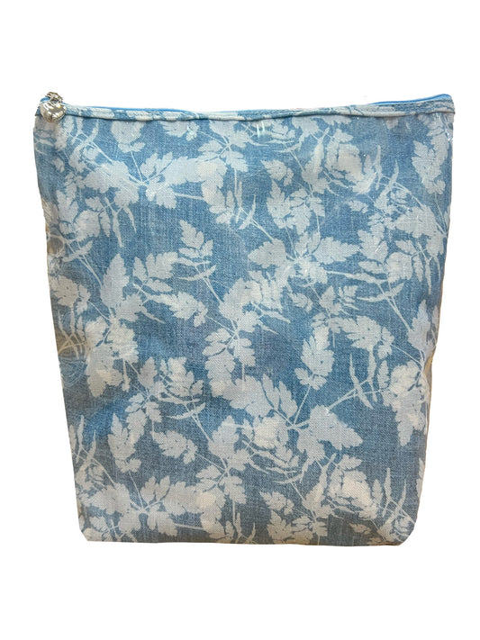 Floral patterned pouch with a zipper on a white background