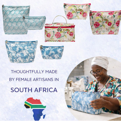 Floral and patterned bags with a woman working on a craft project, set against a white background.