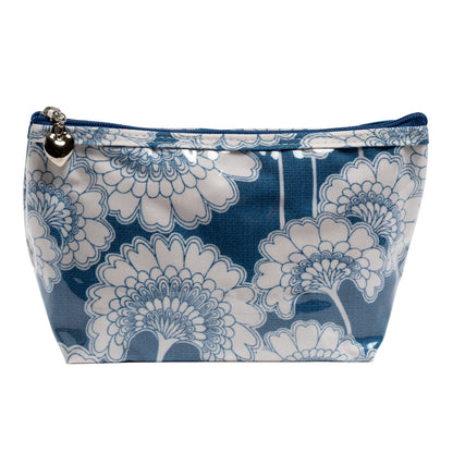 Blue and white floral patterned pouch on a white background