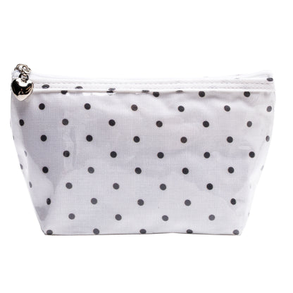 White pouch with black polka dots on a white background