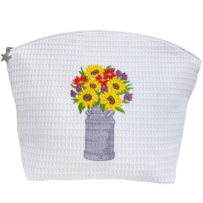 White textured pouch with embroidered flowers on a white background